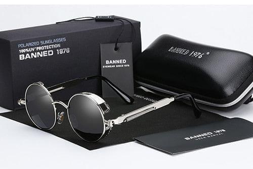 Óculos de sol masculino redondo - Banned 1976 Óculos de sol masculino redondo - Banned 1976 BlackOn-line prateado e preto na caixa 